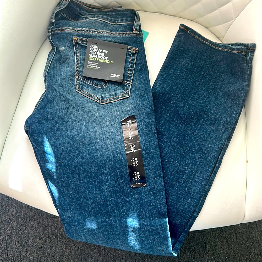 NWT- Curvy Fit Mid Rise Jeans boot cut